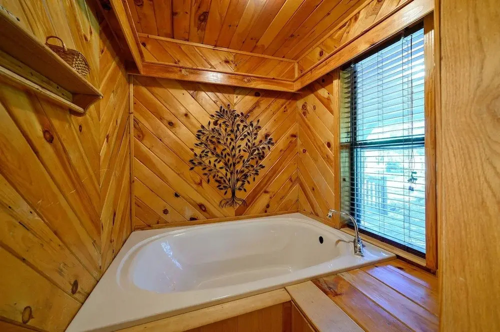 Cast Away Family Cabin with Hot Tub, Fireplace, and Kids Area by RedAwning