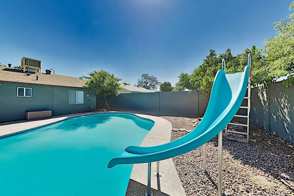 Family Friendly W/ Heated Pool & Waterslide 4 Bedroom Home