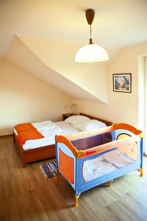 Half of holiday home, terrace, playground