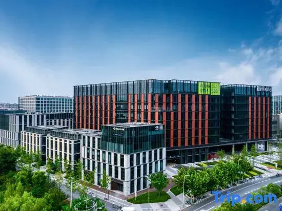 Baole Orange Light Luxury Hotel (Shanghai Qibao Subway Station)