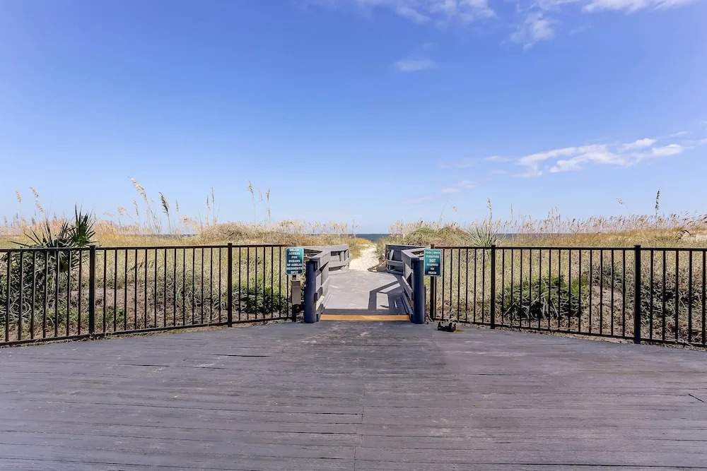 End Unit Oceanside Condo with Spectacular Ocean View from Living Area by RedAwning
