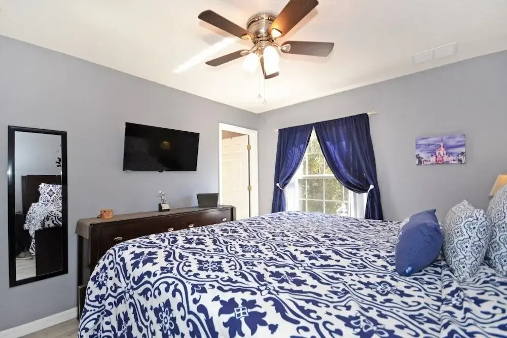 Roomy House Near Disney with Resort Pool and Patio BBQ
