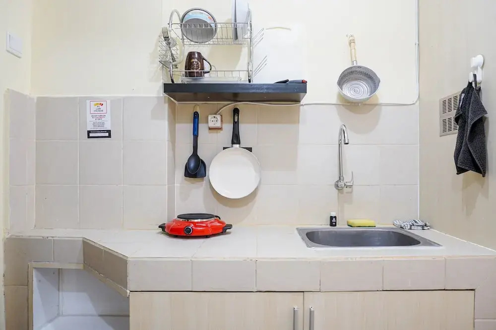 Nice and Elegant Studio at Belmont Residence Puri Apartment By Travelio