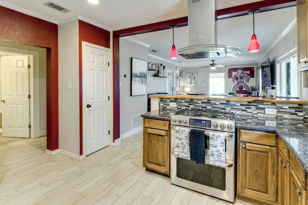 Hot Tub + Outdoor Kitchen: Stylish Home in Bryan
