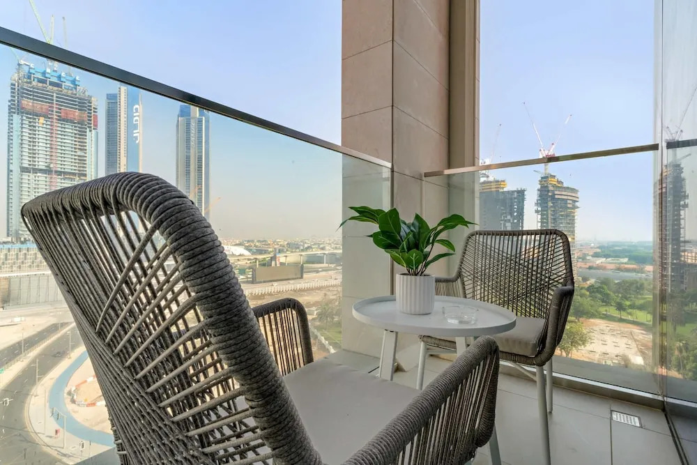 Bright 1BR Escape w Balcony Building Pool