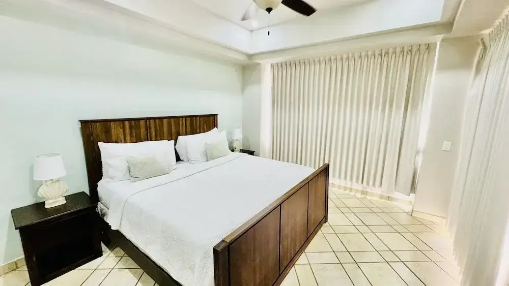 Spectacular 1 1/2 Bedroom Condo on Sandy Beach at Las Palmas Beachfront Resort 1 Condo by RedAwning