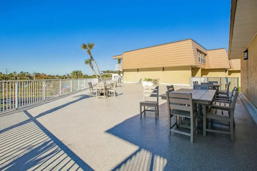 Beachfront Gem: Serene 2BD Haven With Pool & Views