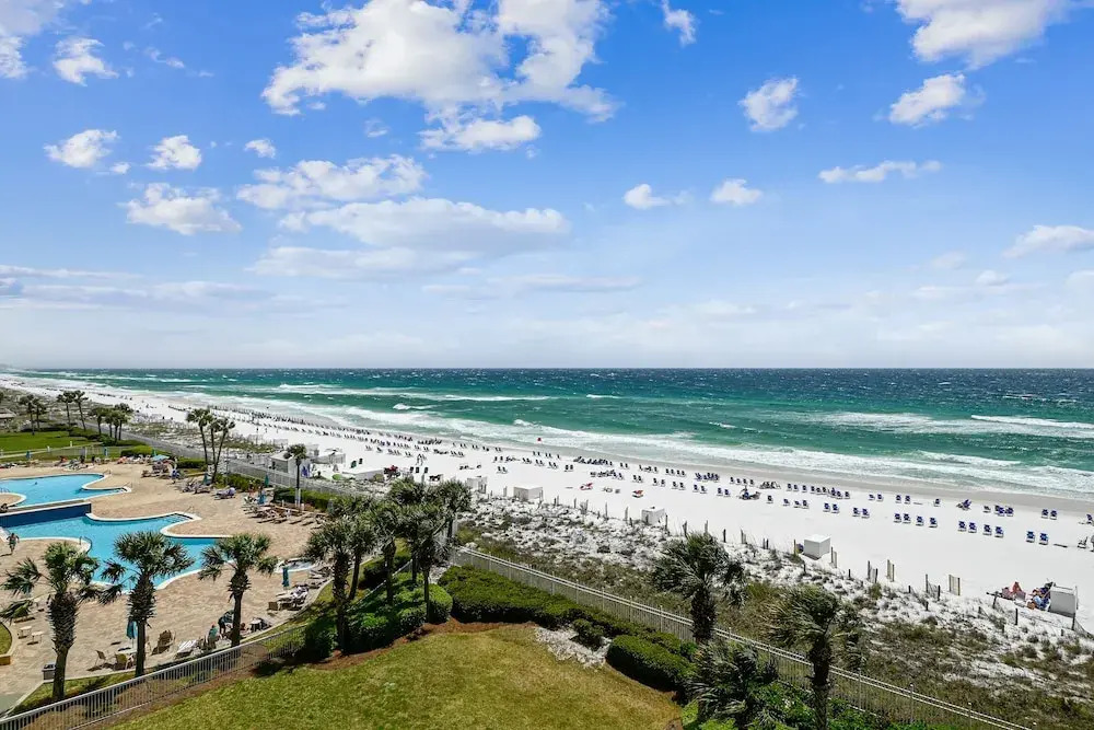Silver Beach 506 is a gorgeous Gulf Front 4 BR with free beach service - sleeps 8 by RedAwning
