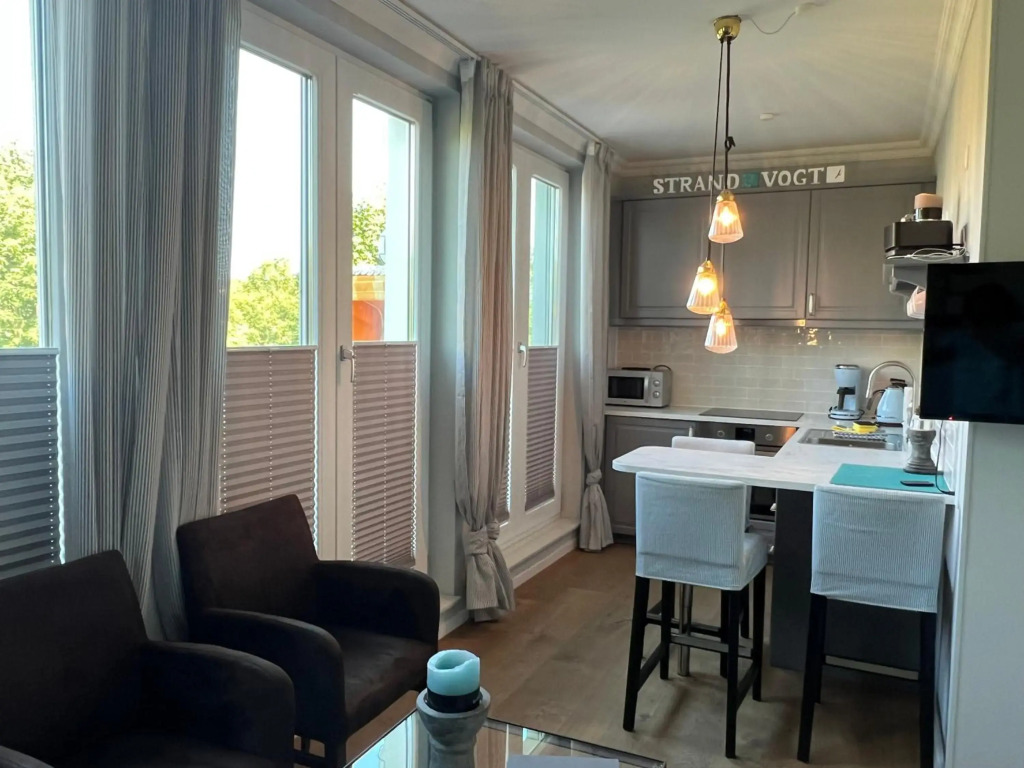 Strandvogt - wunderschöne Ferienwohnung mit Parkettboden und Sonnenbalkon