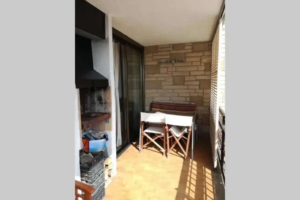 Apartament a Roses. Terrassa i piscina comunitaria