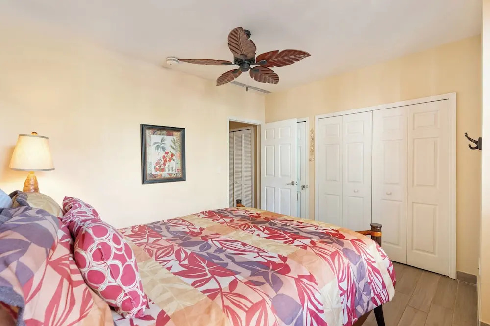 Luxe! Impressively designed 2nd-floor unit in Coco done in red and orange hues