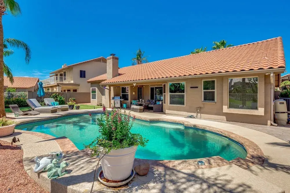 Updated waterfront home w/ private Heated pool & garage. Near Arrowhead shops! by RedAwning, Glendale