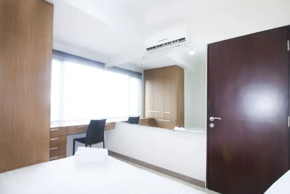 2BR Cozy at Empyreal Epicentrum Apartment By Travelio