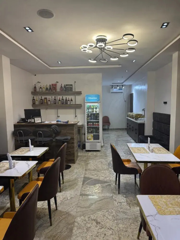 Bottega Apartment & Suites
