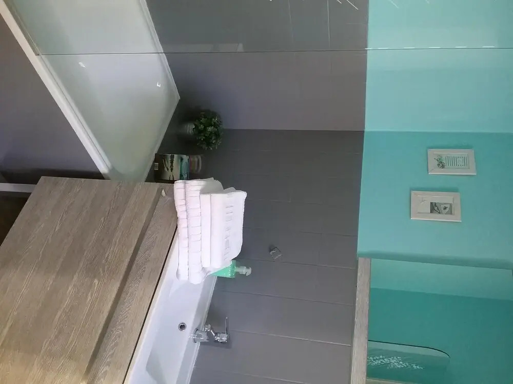 Small house between lake and sea