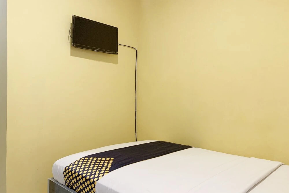Mande Guesthouse by RedDoorz