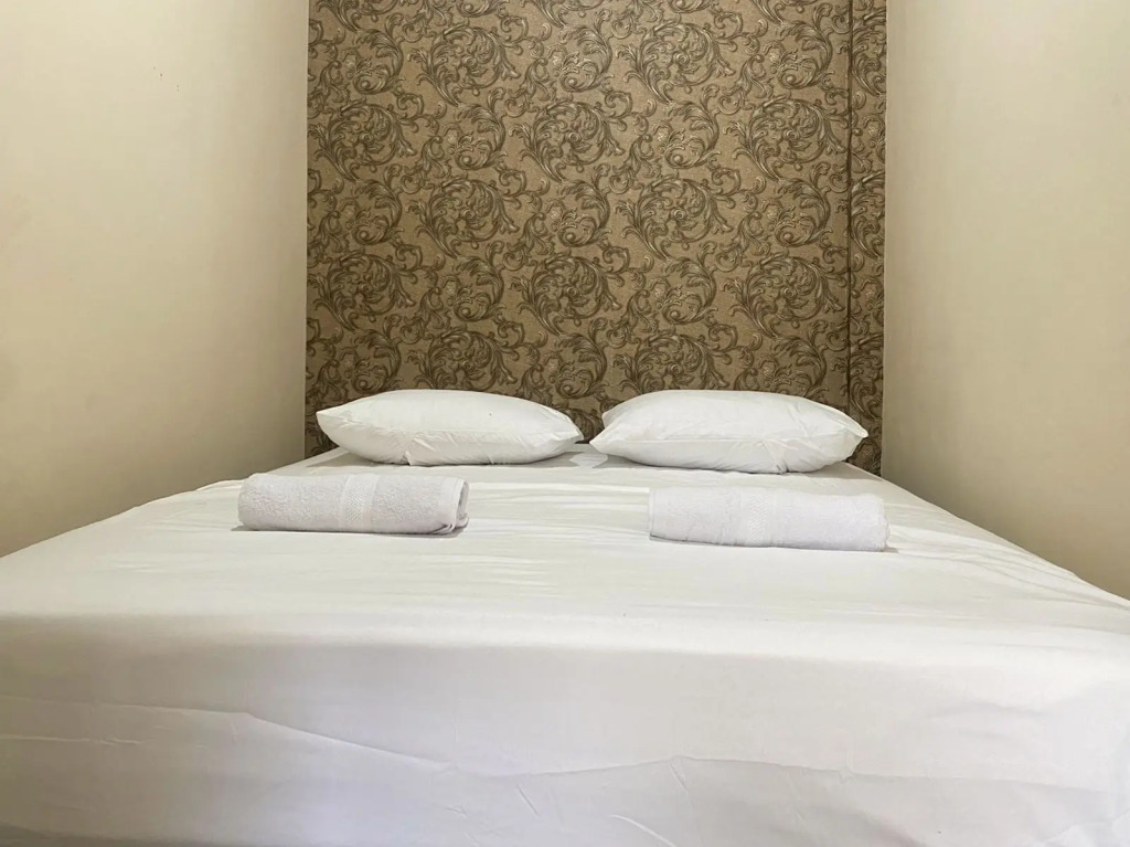 CK Homestay Syariah near Lippo Plaza Jambi Mitra RedDoorz