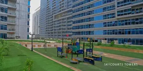 The Dubai Holiday Home, spacious 2 Bedroom Apartment, podium landscape view