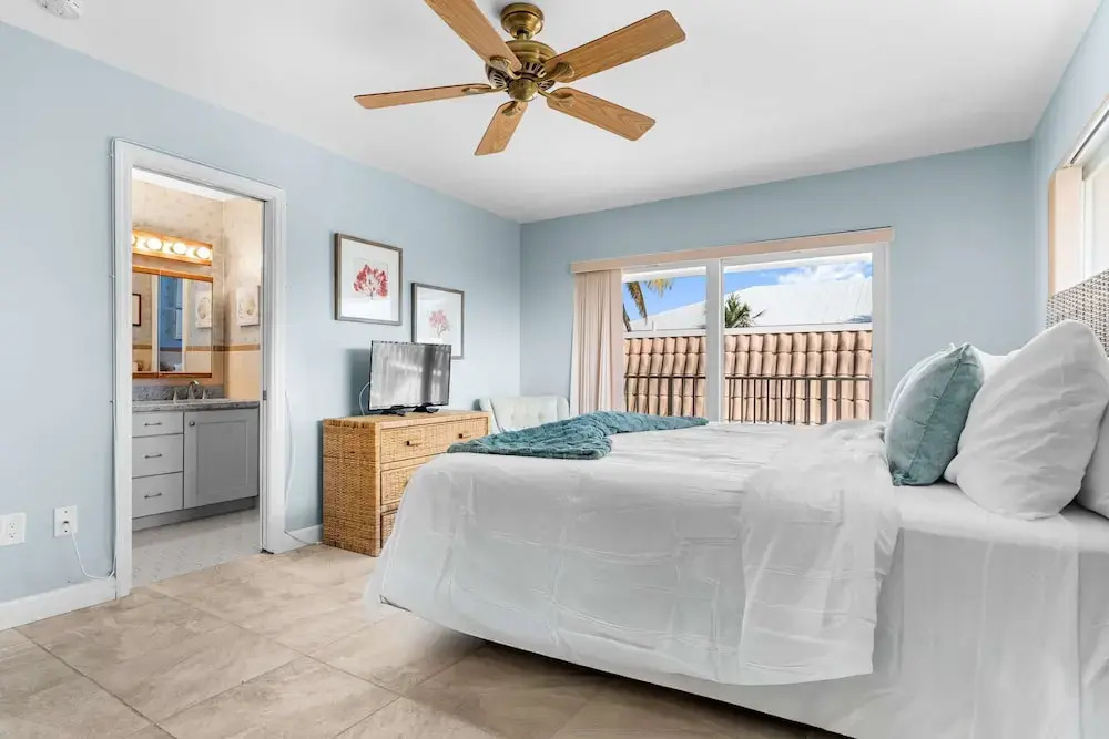 Sunset Harbor Waterfront Villa with Dock Cabana Club