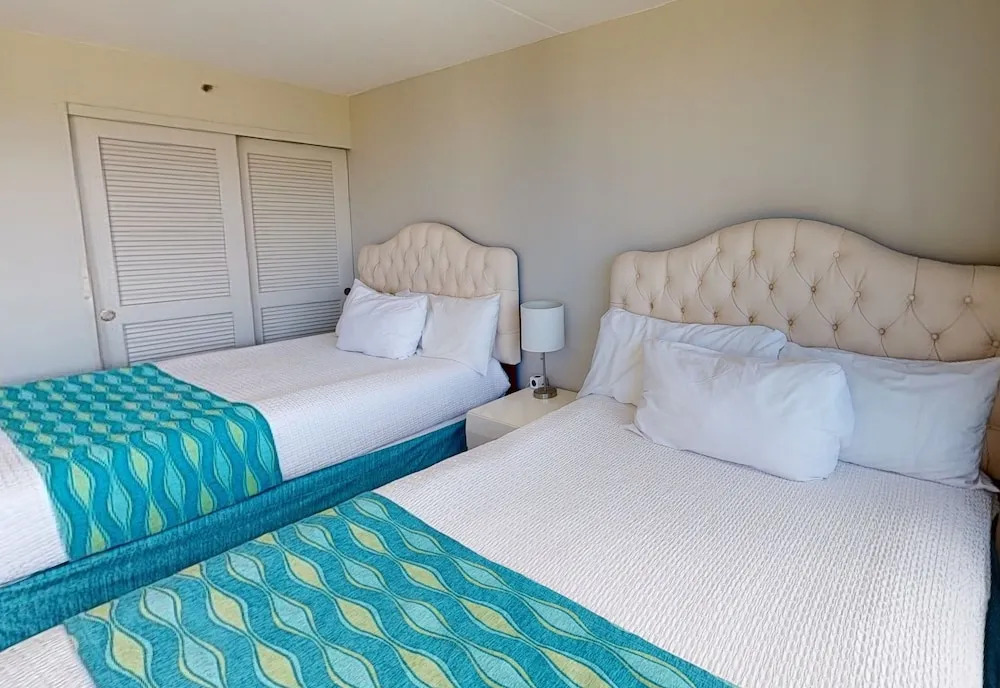 Waikiki Banyan High Level Condo with Ocean Views from the Private Lanai