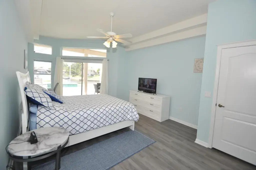 Sunset Bay Beautiful Pool Home - Bring Your Boat or Jet Ski - Canal with Dock- Sleeps 10 - 4 BD