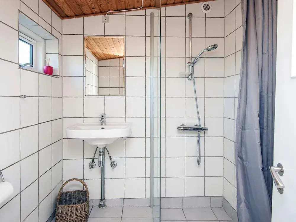 4 person holiday home in Grenaa