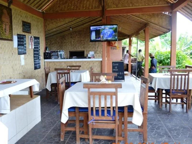 Paradise Palm Beach Bungalows and Dive Center