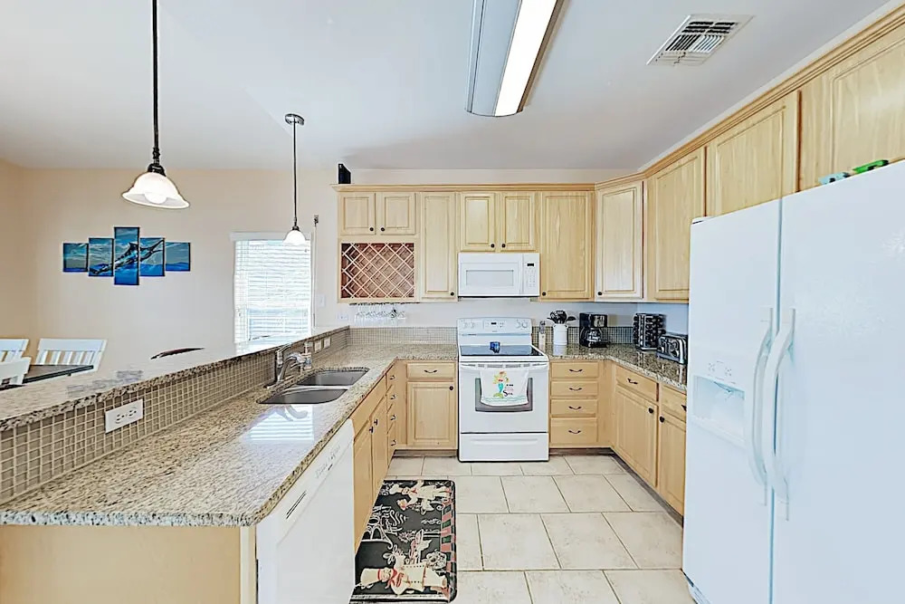 New Listing! Updated W/ Rooftop Deck 3 Bedroom Home