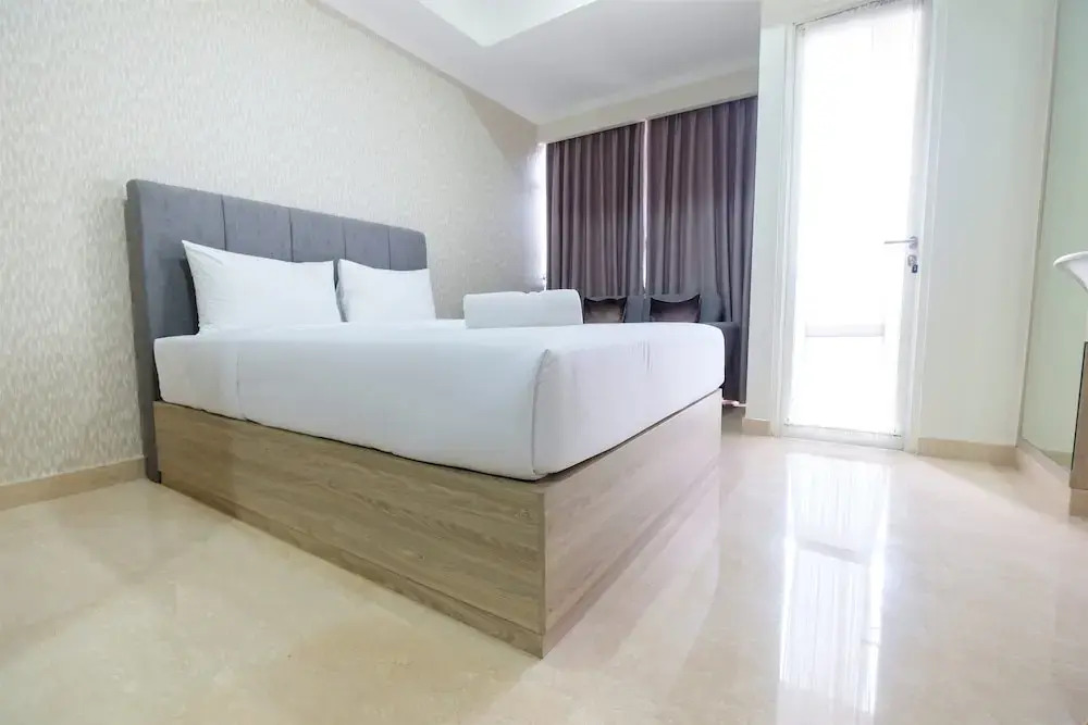 Minimalist and Comfort Studio Menteng Park Apartment By Travelio