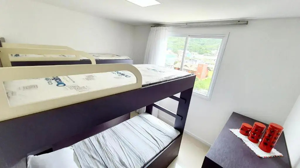 Residencial Renata - Apartamento na Praia de Palmas - 3 dormitórios a 300m da Praia