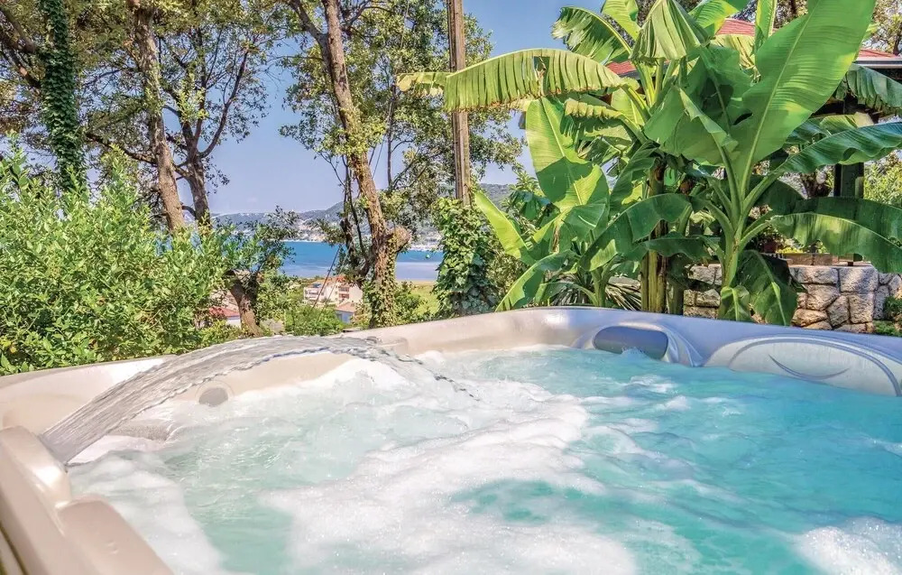 Awesome Home in Supetarska Draga with Hot Tub, WiFi & 2 Bedrooms
