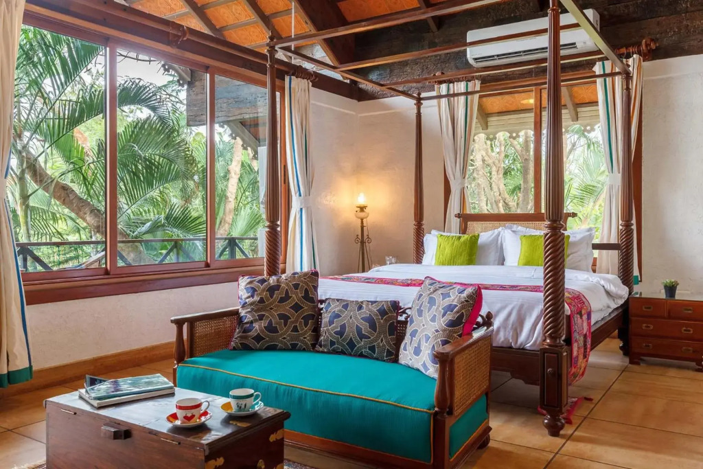 Aranyam Villa by StayVista with Modern wooden interiors, Kidszone, Indoor games & plunge pool
