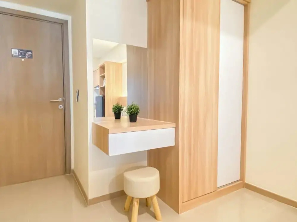 Warm Minimalist Studio Apartment Near Paramadina University At Meikarta