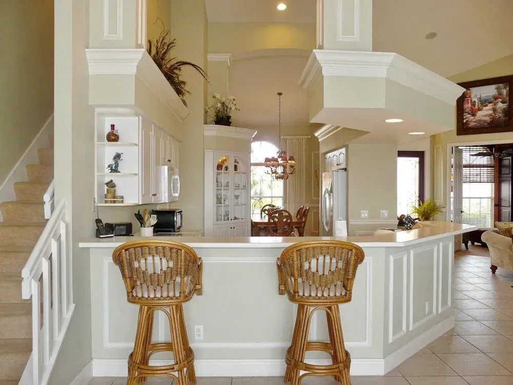 Large waterfront home with all-day sun on pool