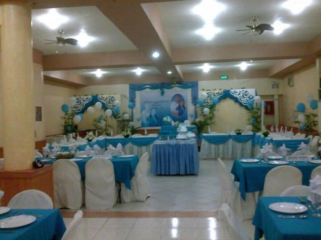 Plaza Maria Luisa Suites Inn
