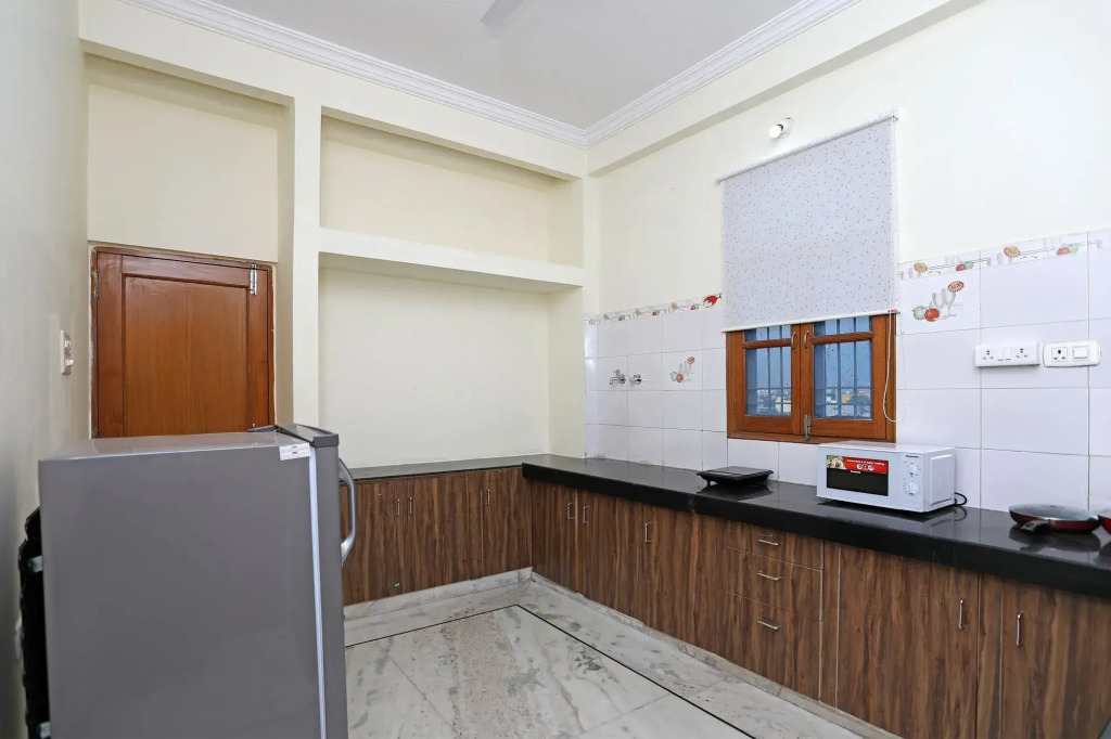 Urvi Apartments by OYO Rooms