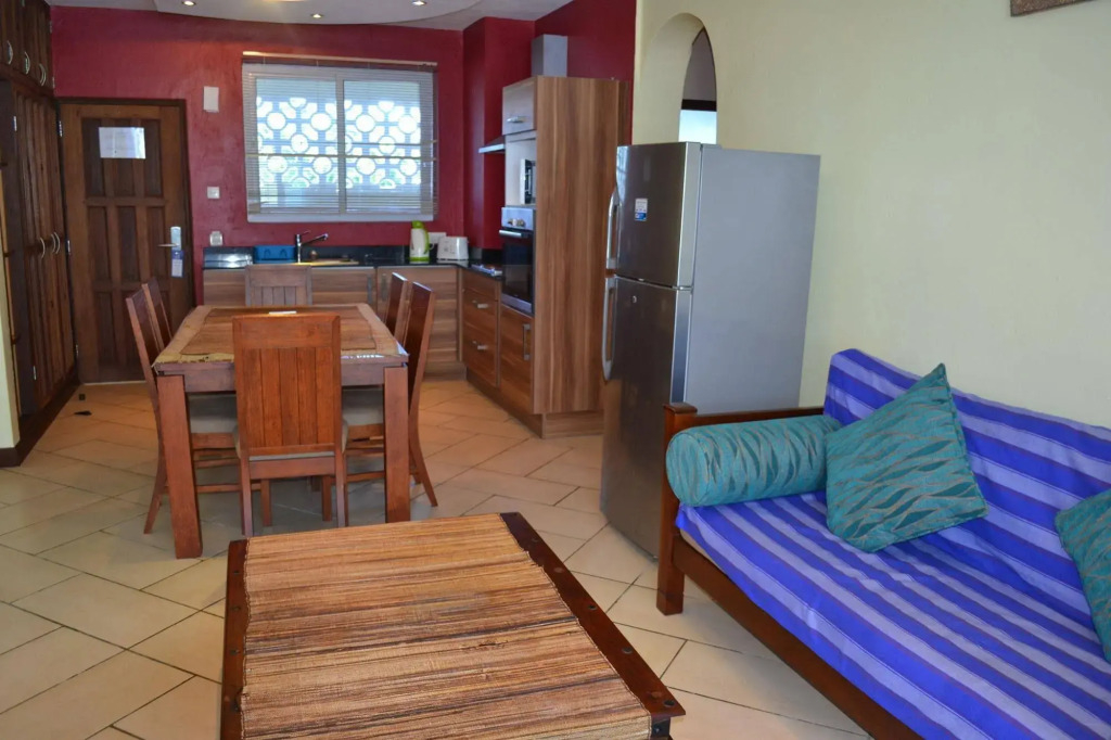 Cowrie Shell Beach Apartments Official