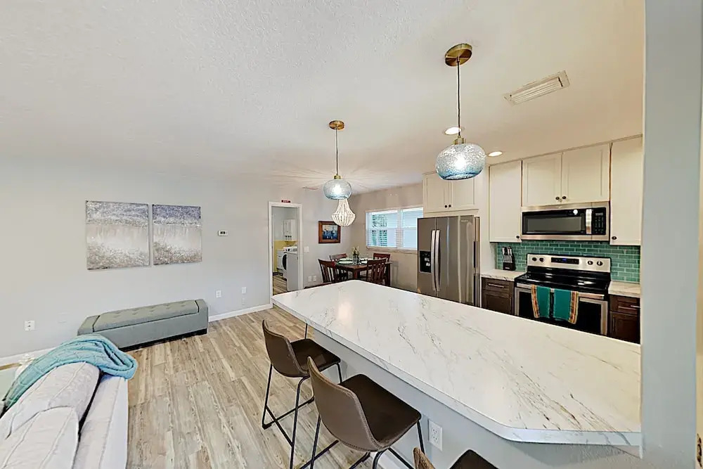 New Listing! Updated Coastal Gem W/ Screened Porch 3 Bedroom Home