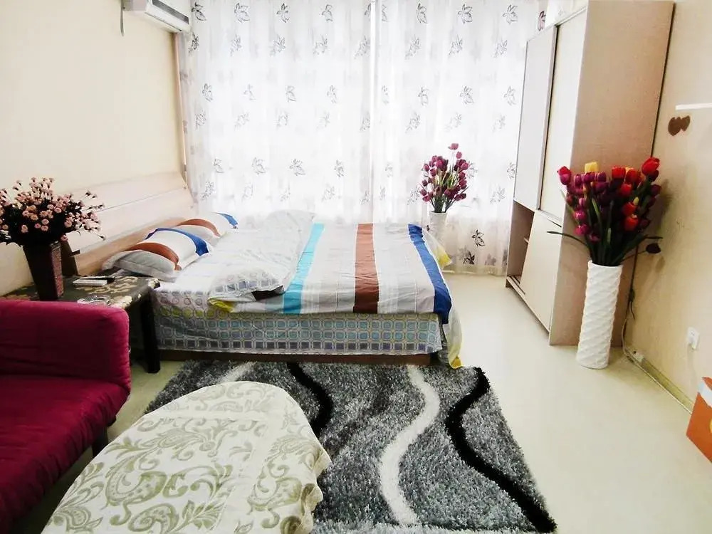 Qingdao Noah Tourist Apartment (CBD Wanda Plaza)
