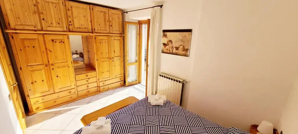 Appartamento con ingresso autonomo, giardino privato e portico