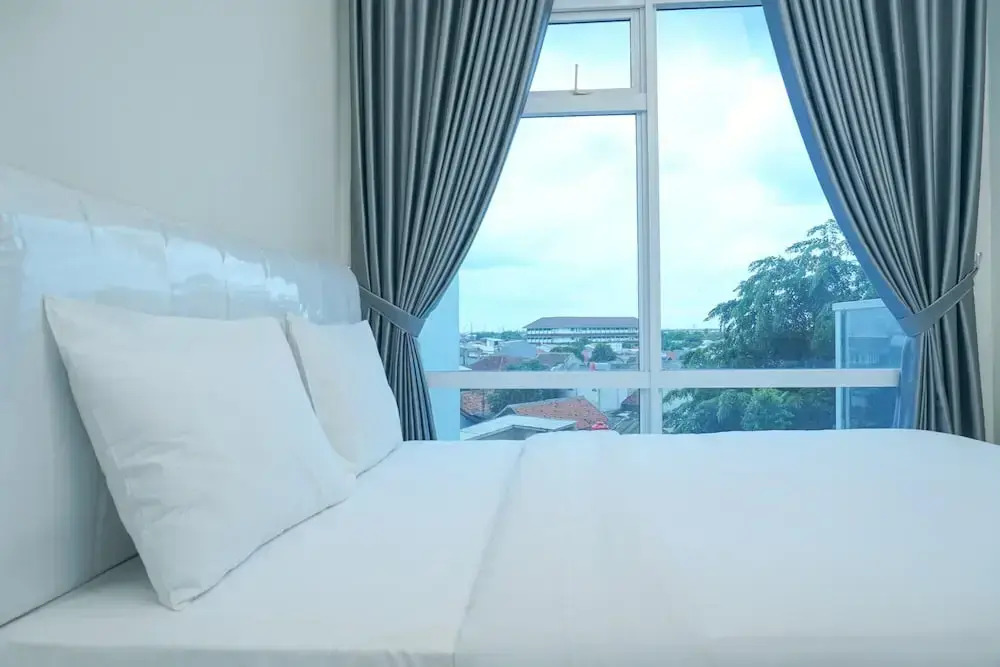 Strategic Location 1BR Apartment @ Puri Mansion near Puri By Travelio