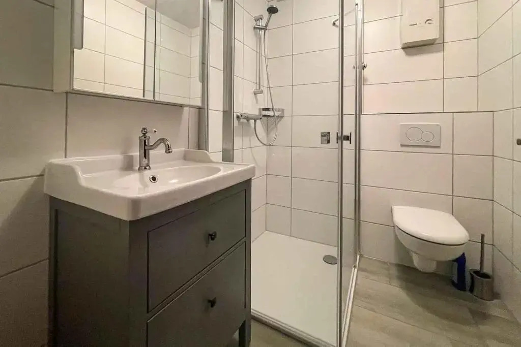 Ferienwohnung-9-mit-Terrasse-Garten-Landhaus-Hubertus-Duhnen