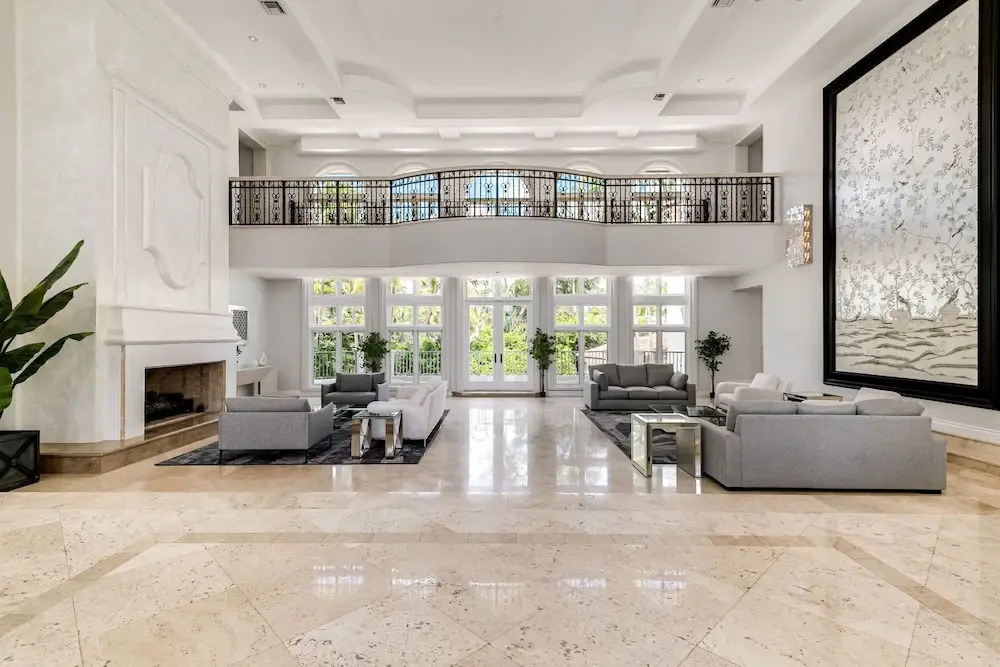 Waterfront Mansion With Game Room Gym Media Room and Guest House