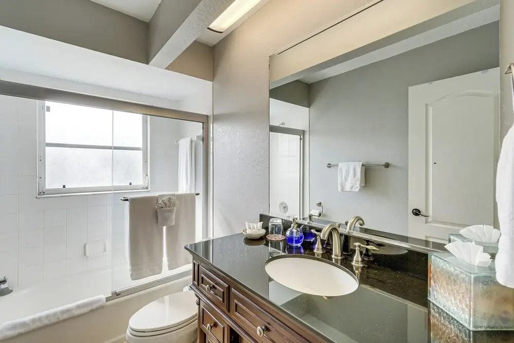 Luxe Waterfront Oasis w/ Dock, Heated Pool & Spa!