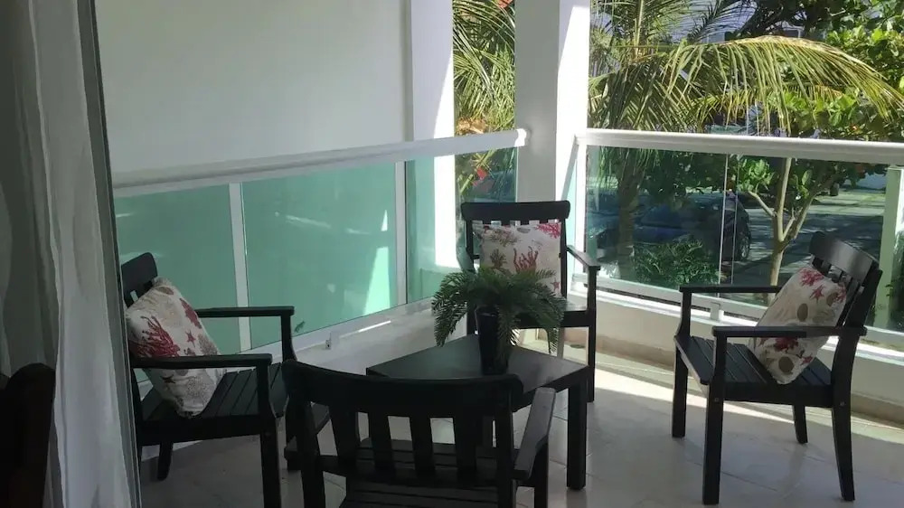 Sunny apartment at the beach with pool
