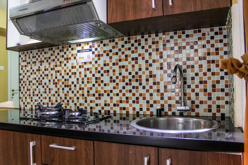 Comfortable and Tranquil 2BR Apartment at Green Pramuka By Travelio