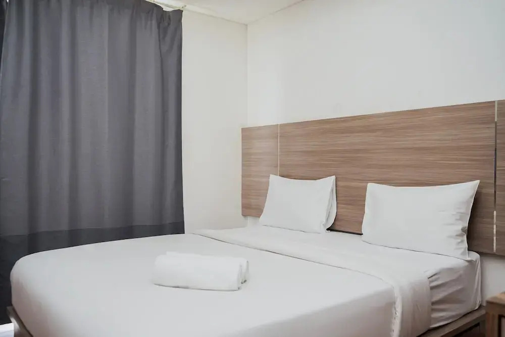 Comfort And High Floor Studio Room At Casa De Parco Apartment