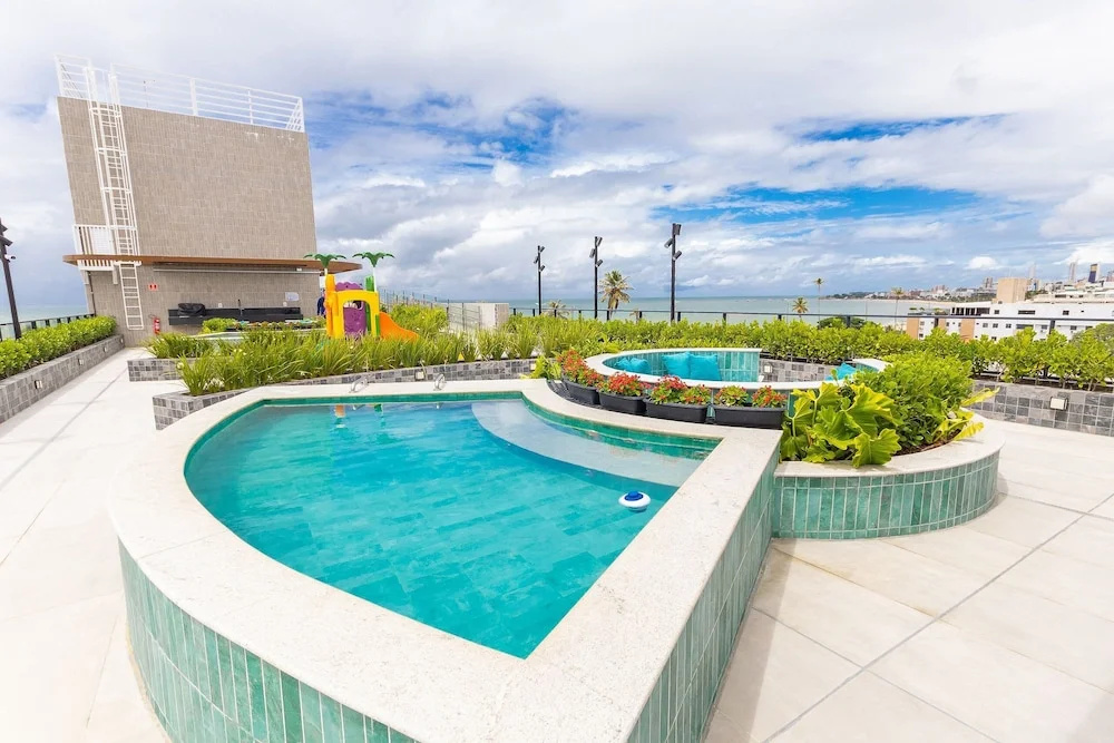 Garden Haus - Beachfront at Bessa Beach Housi by Carpediem