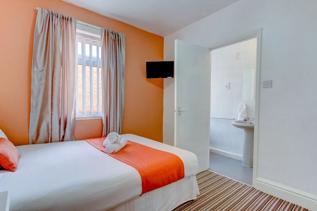The Sandringham Court Hotel and Apartment