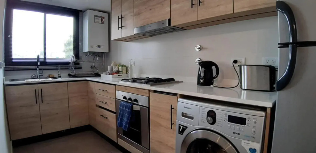 Departamento Moderno - Equipado y Con Cochera Privada
